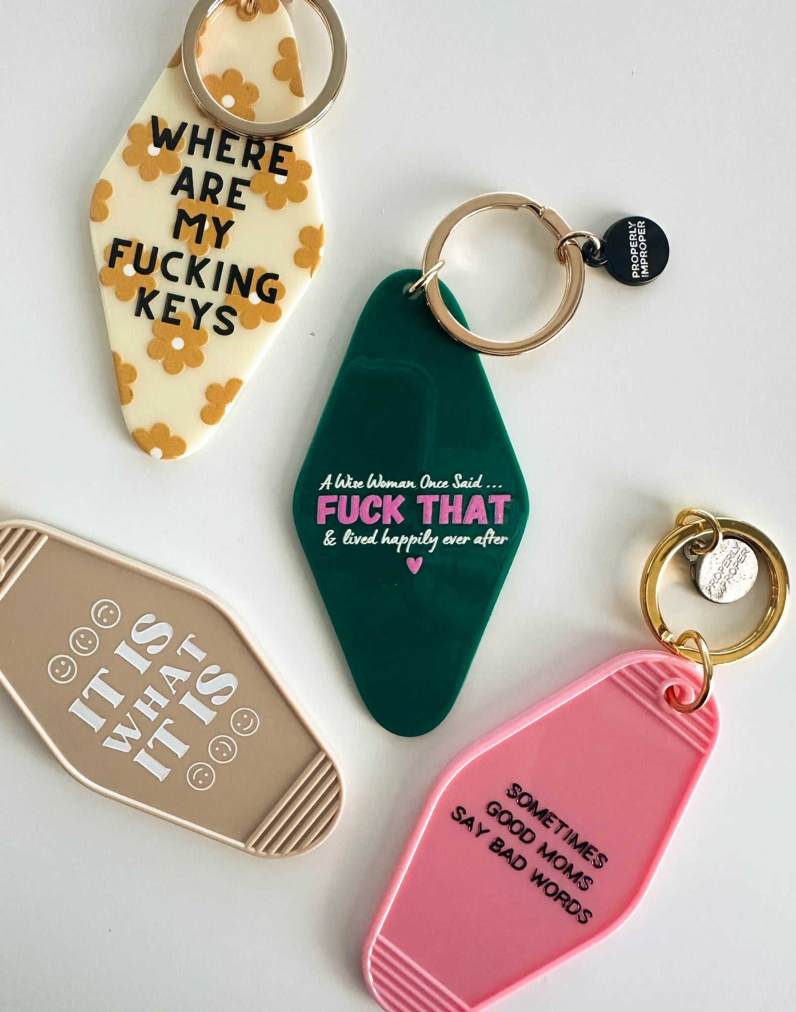 NEW ITEM: Hot Stamped Motel Keychain // A Wise Woman Once Said - notebooks & honey